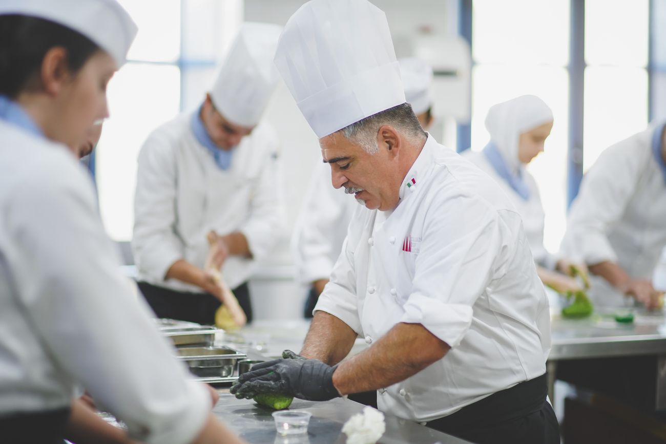 Italian chef Lucio Forino giving the students at the Royal Academy of Culinary Arts (RACA) a culinary course dubbed, "Modern Italian Master Class," as part of the Italian Culinary Week 2019 