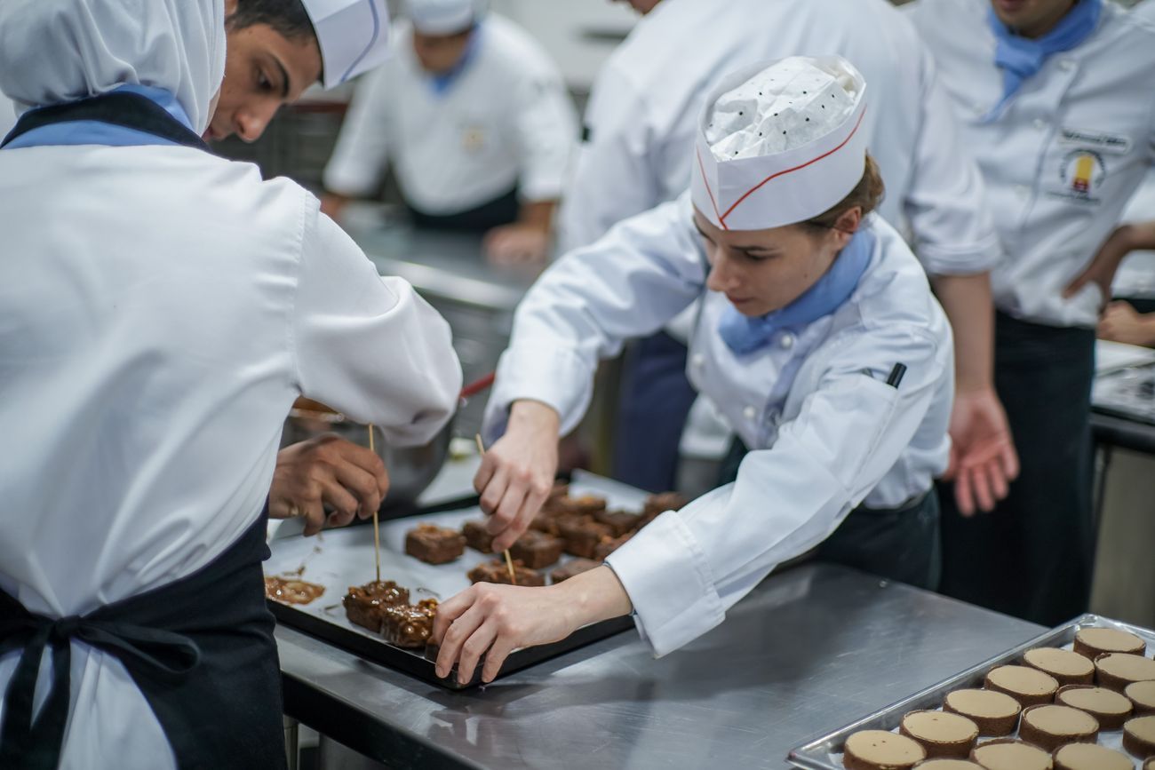 RACA students macking tiramisù at Pastry Modern Plating Techniques course